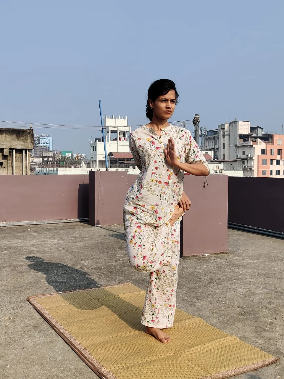 Ritika ji practicing yoga and pranayama on her terrace